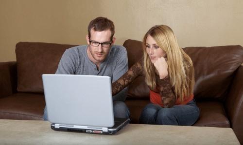 Couple attending Online Counseling Session on their computer 